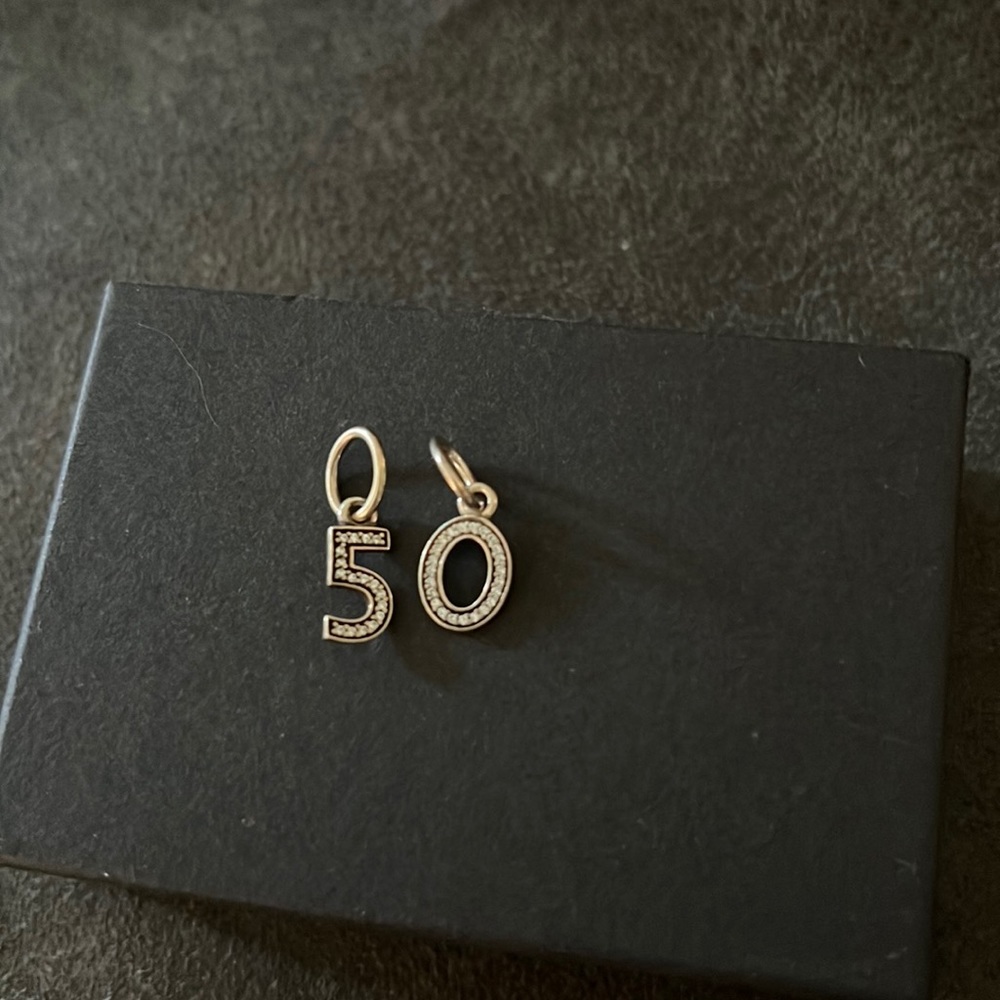 Pandora charms “5” and “0”